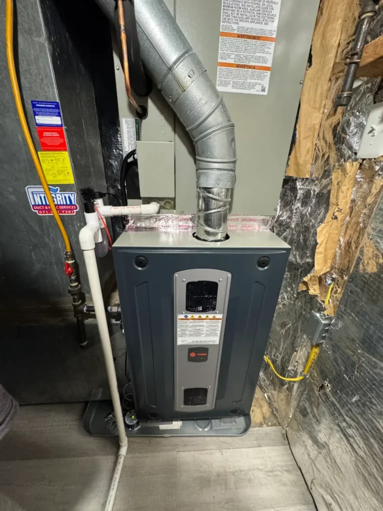 New Trane dual fuel furnace installation with updated ductwork