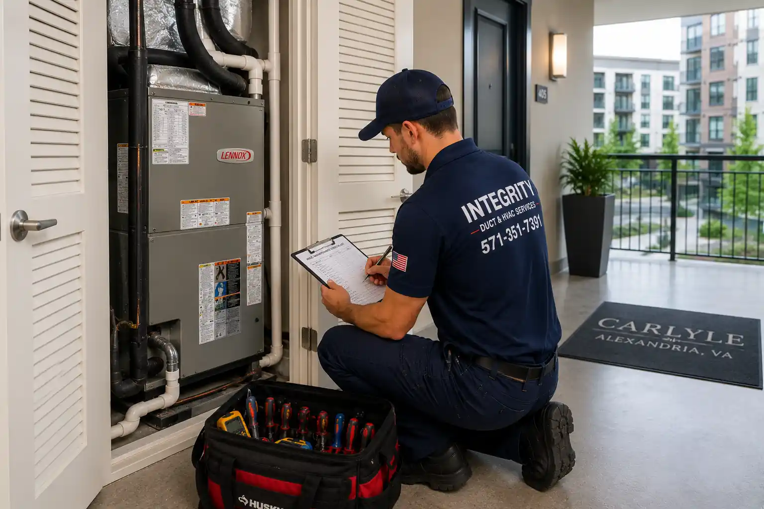 Integrity HVAC technician performing condo HVAC maintenance in Carlyle and Eisenhower Valley Alexandria VA